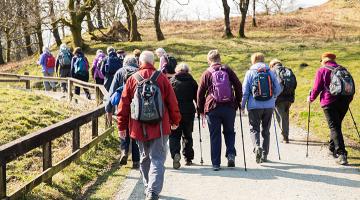 a group of older people on a hike